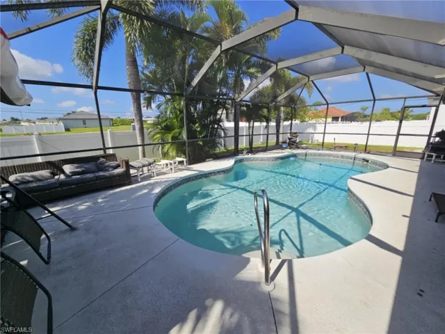 View of swimming pool w/enclosure