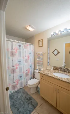 2nd Bathroom w/shower-tub combo; single sink