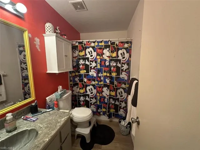 1023 Bathroom with toilet and large vanity