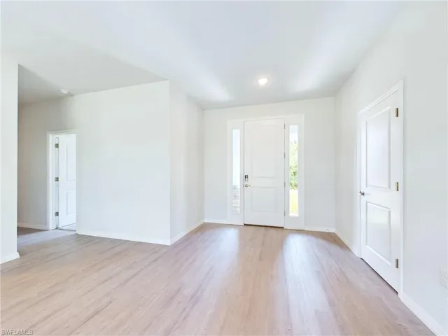 Foyer with light wood-type flooring