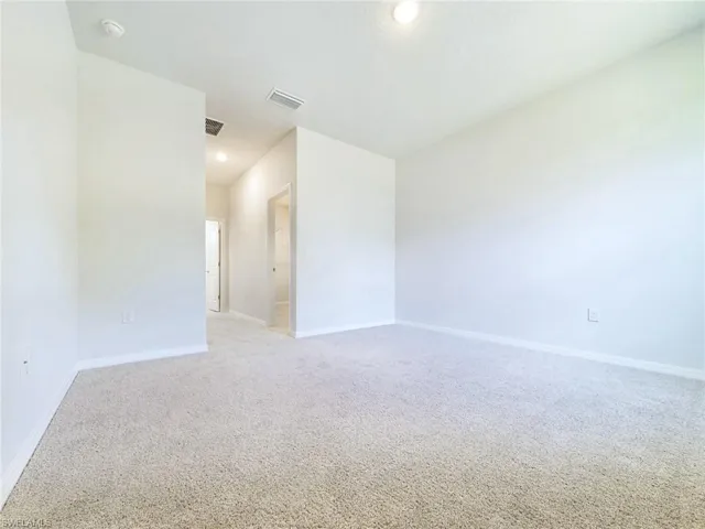 View of carpeted spare room