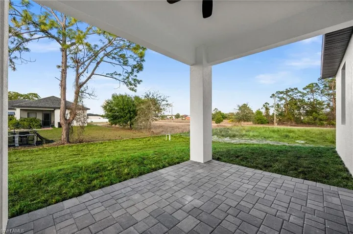 View of patio with a ceiling fan