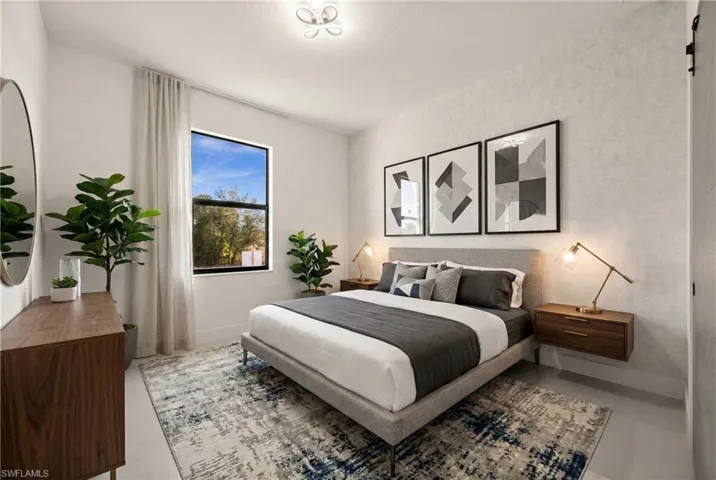 Bedroom featuring baseboards