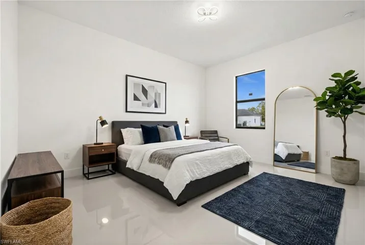 Bedroom with baseboards