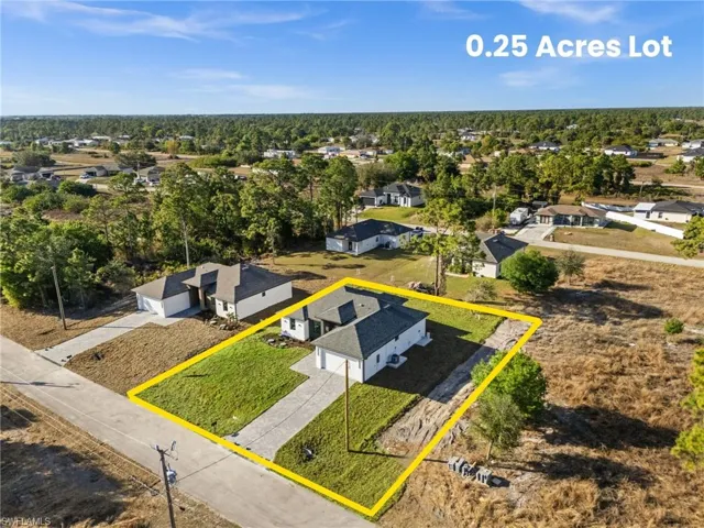 Aerial perspective of suburban area featuring property boundaries highlighted
