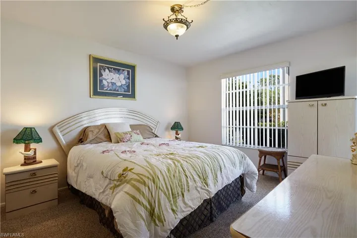 Bedroom featuring carpet flooring