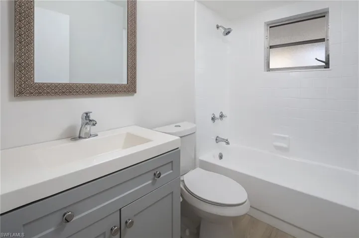 Guest Bathroom with vanity and tub / shower combination