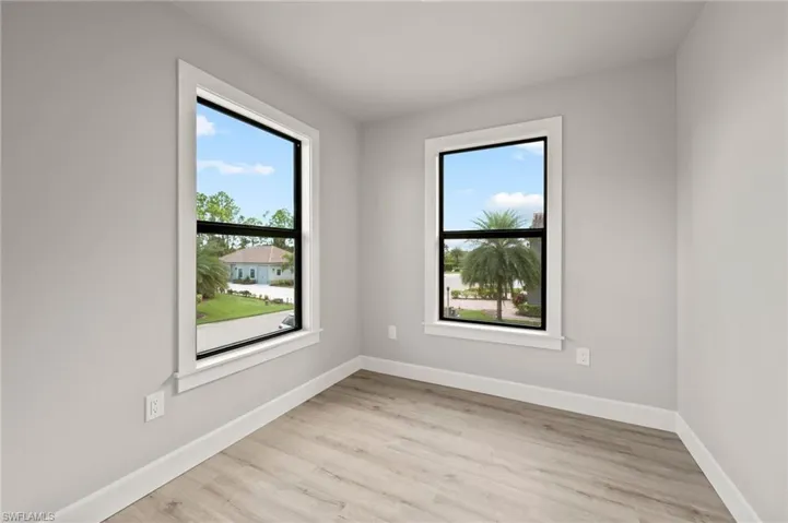 Spare room with light hardwood / wood-style floors