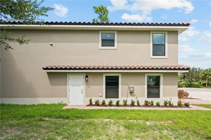 Mediterranean / spanish-style home featuring a front lawn