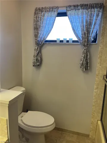 Bathroom with a shower and toilet