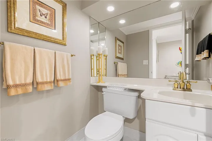 Half bath/powder room, unit has 2.5 baths total.