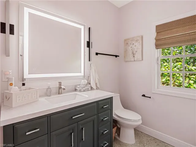 Bathroom with vanity and toilet