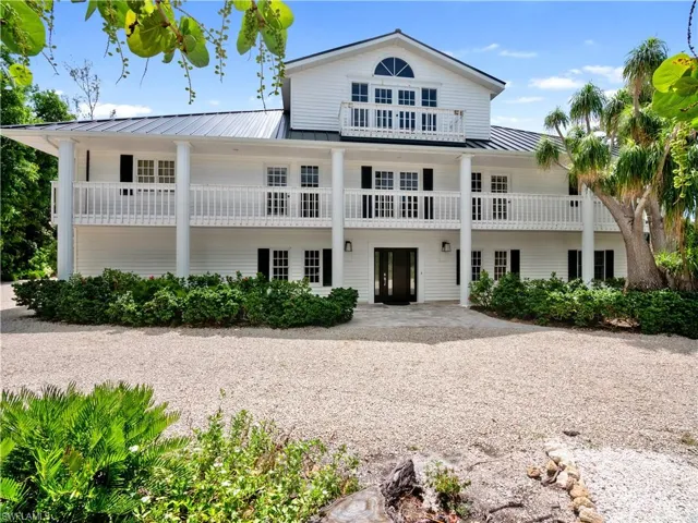 View of front of property featuring a balcony