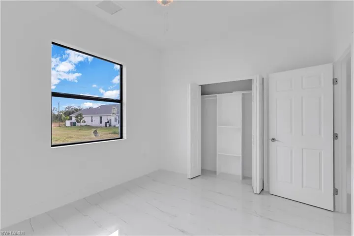 Unfurnished bedroom with a closet
