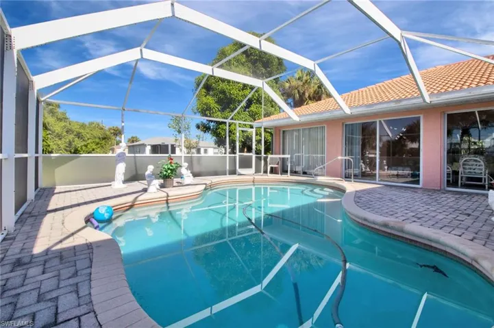 View of swimming pool featuring a fenced in pool and a patio area