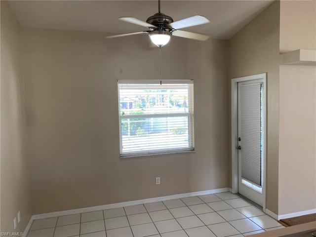 The adjoining Breakfast Nook has an entrance to the covered Lanai and overlooks the Pool and Landscaped rear yard.