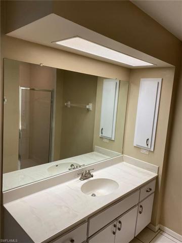 Master Bath vanity has lots of counter and cabinet space plus wall medicine cabinet.