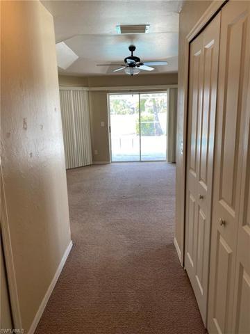 View to the pool. Double bi-fold door for the large walk-in closet is on the right.