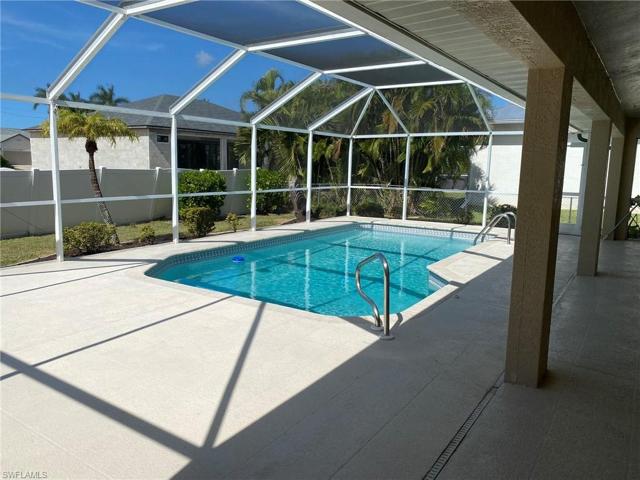 Large under truss Lanai and extended pool deck allows for plenty of space to relax or entertain.