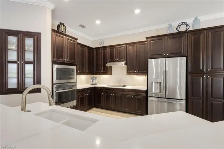 Cherry Cabinetry and New Quartz Counter Tops