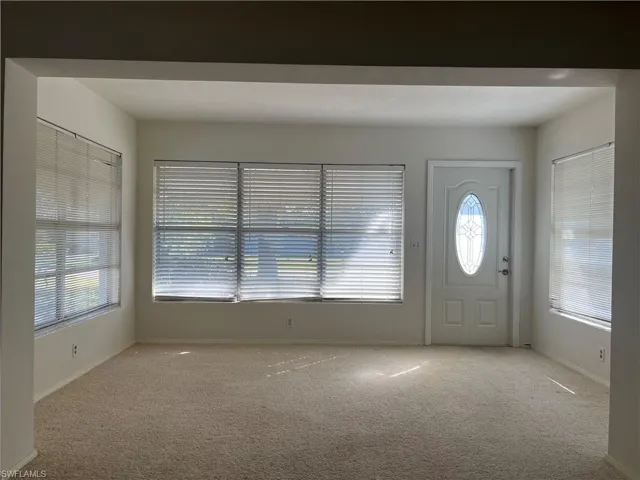 View of carpeted foyer