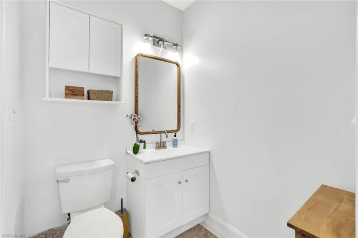 Bathroom with vanity and toilet