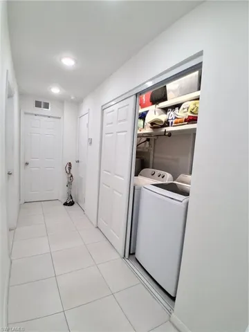 Laundry and Water heater in hallway