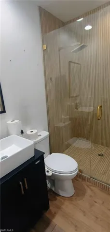 Full bath featuring a shower stall, vanity, 2nd Floor