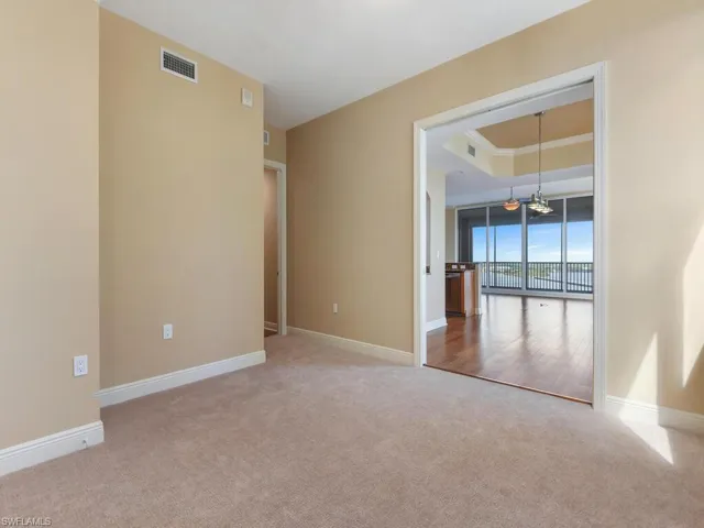 Home office/ 3rd bedroom/ gym w/ pocketing doors to dining & living area