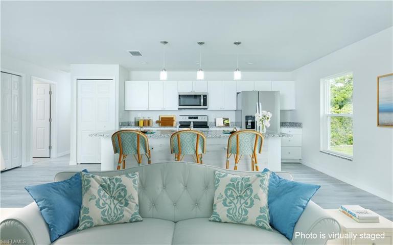VIRTUALLY STAGED AT COMPLETION