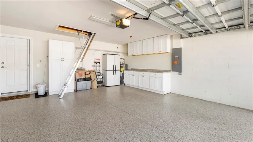 Extra wide garage with epoxy flooring