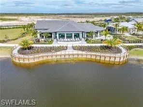 Rear view of house featuring a water view
