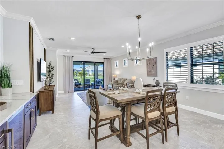 Custom Built entertaining area with beverage fridge and storage