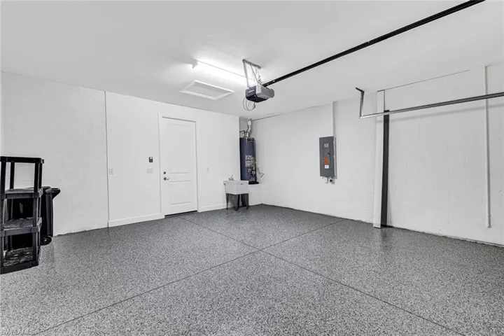 Includes sink and epoxy floor