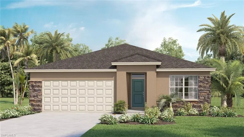 View of front of property with a garage and a front yard