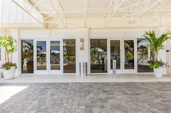 Entrance to property with french doors and a patio area