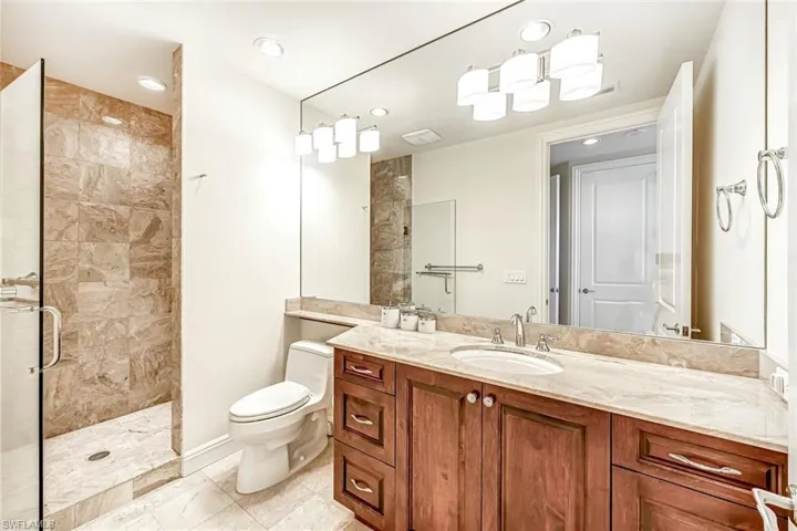 Guest bathroom with large walk in shower.
