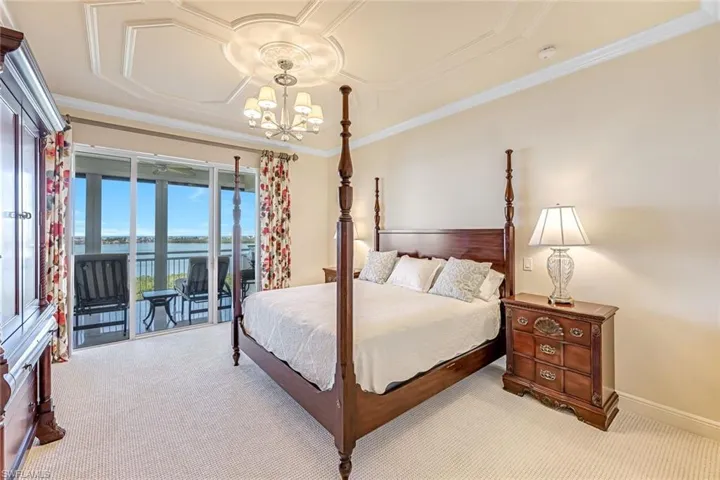 Primary bedroom with lanai access.