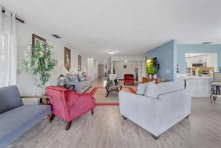 Living room featuring light wood-style floors