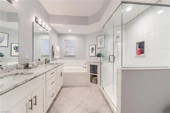 RE-MODELED BATHROOM OFFERS ADDITIONAL STORAGE SPACE