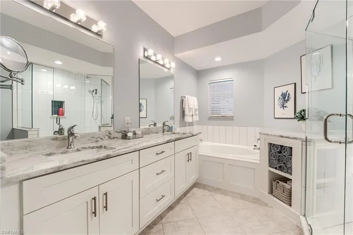 NEW SHAKER CABINETRY, PLUMBING FIXTURES, LIGHT FIXTURES AND QUARTZ COUNTERTOPS