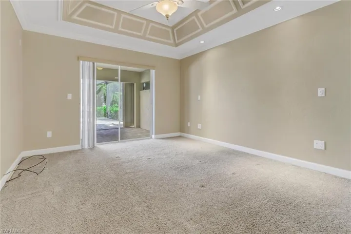 Empty room with carpet floors and ornamental molding