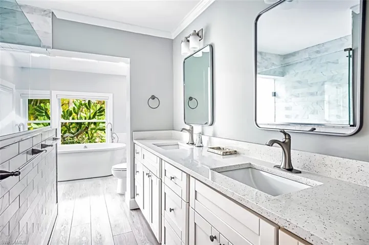 Primary_bath_with_walk-in_shower_and_tub