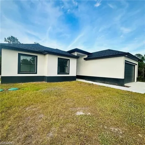 Modern exterior with a contrasting white and black color palette