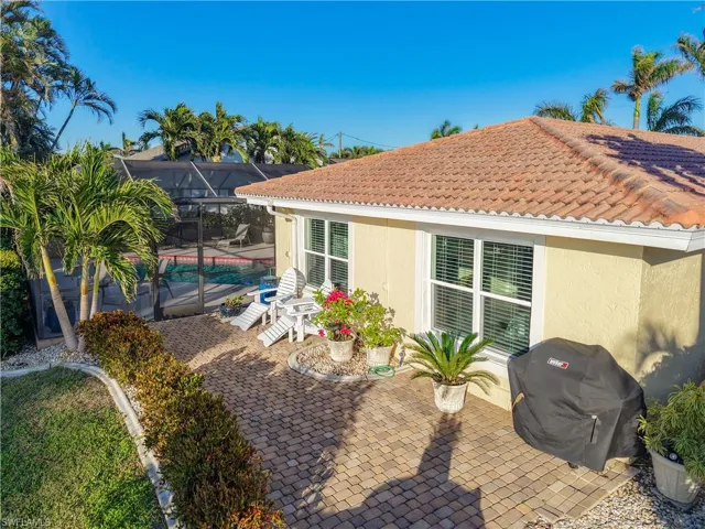 Rear view of property with a patio