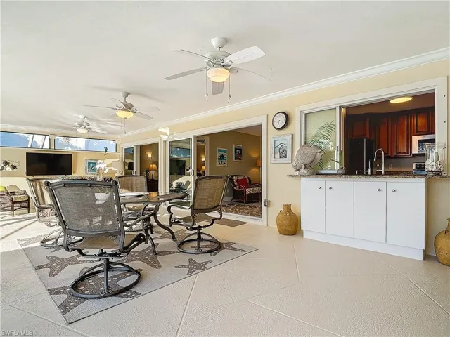 Lanai with water proof  cabinet.  3 ceiling fans