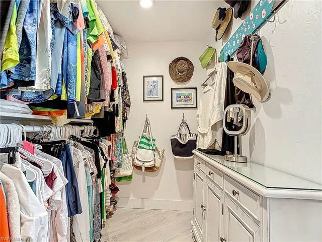 View of spacious master closet.