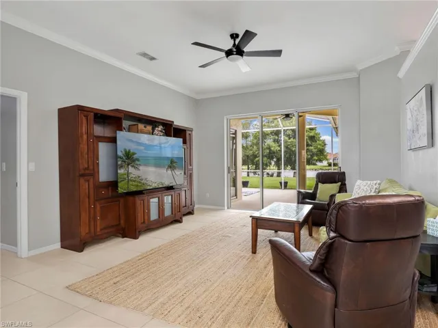 Living Room with Crown Molding, Ceiling Fan - Leading to Primary Bedroom