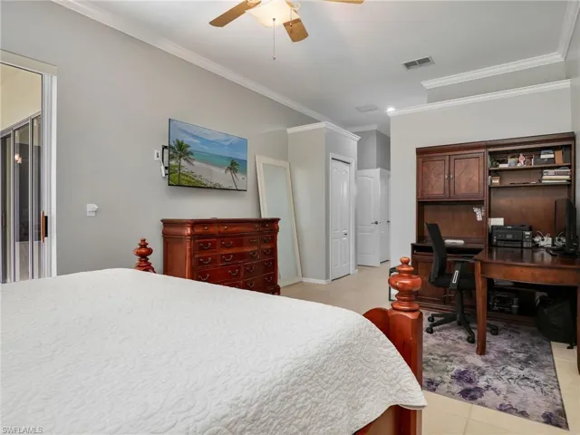 Primary Bedroom with Crown Molding
