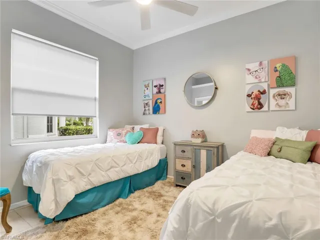 Second Bedroom with Crown Molding and Ceiling Fan